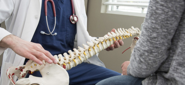 chiropractor-discussing-spine